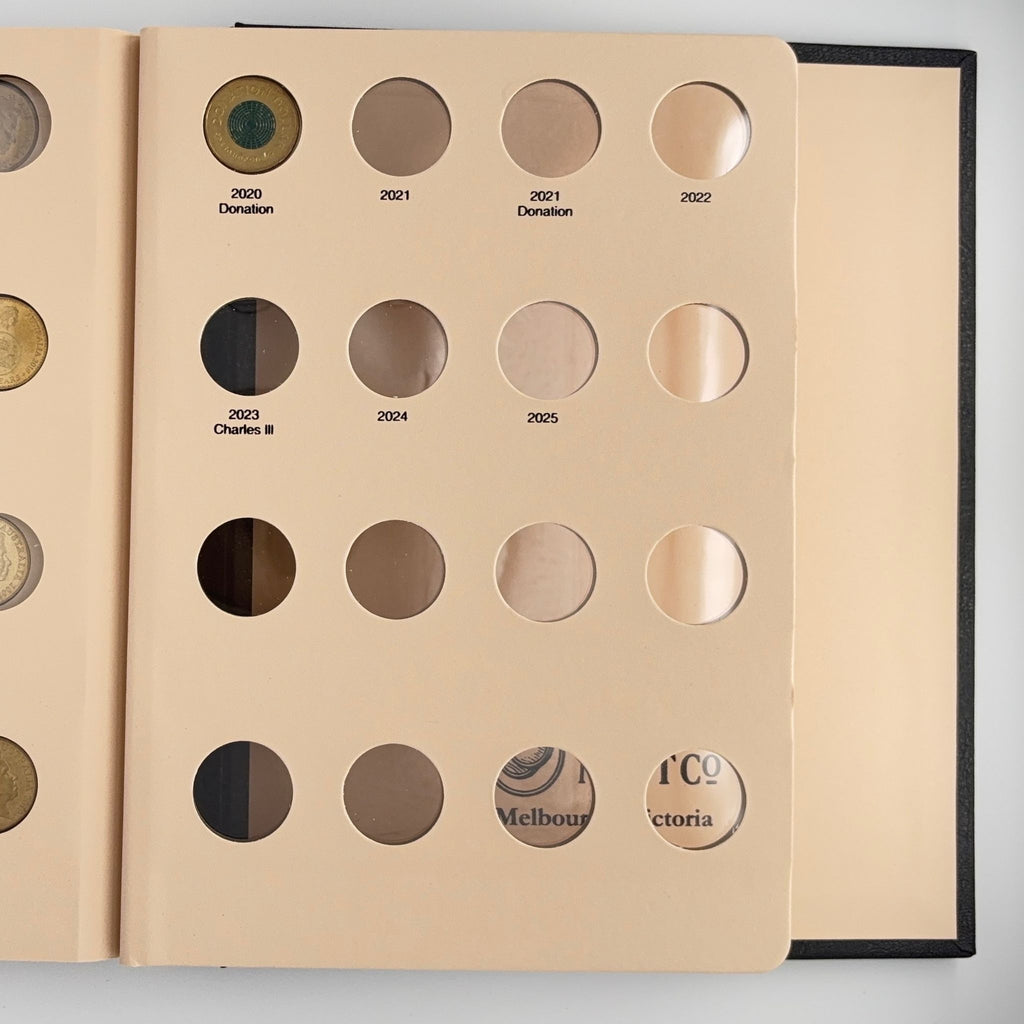Australian One Dollar Coin collection in an album with various coins displayed